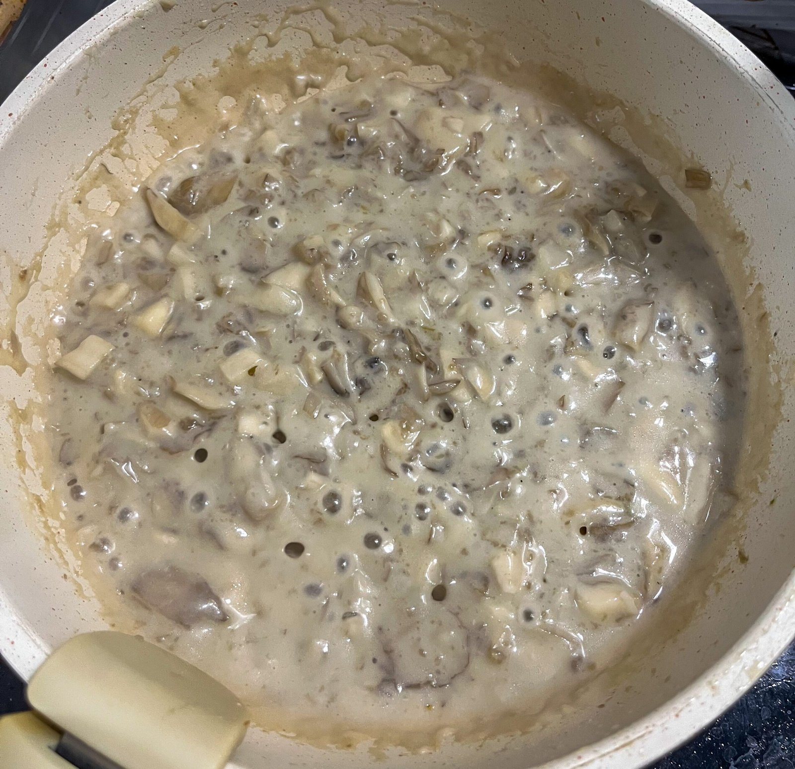 cream of mushroom soup maitake in a pan