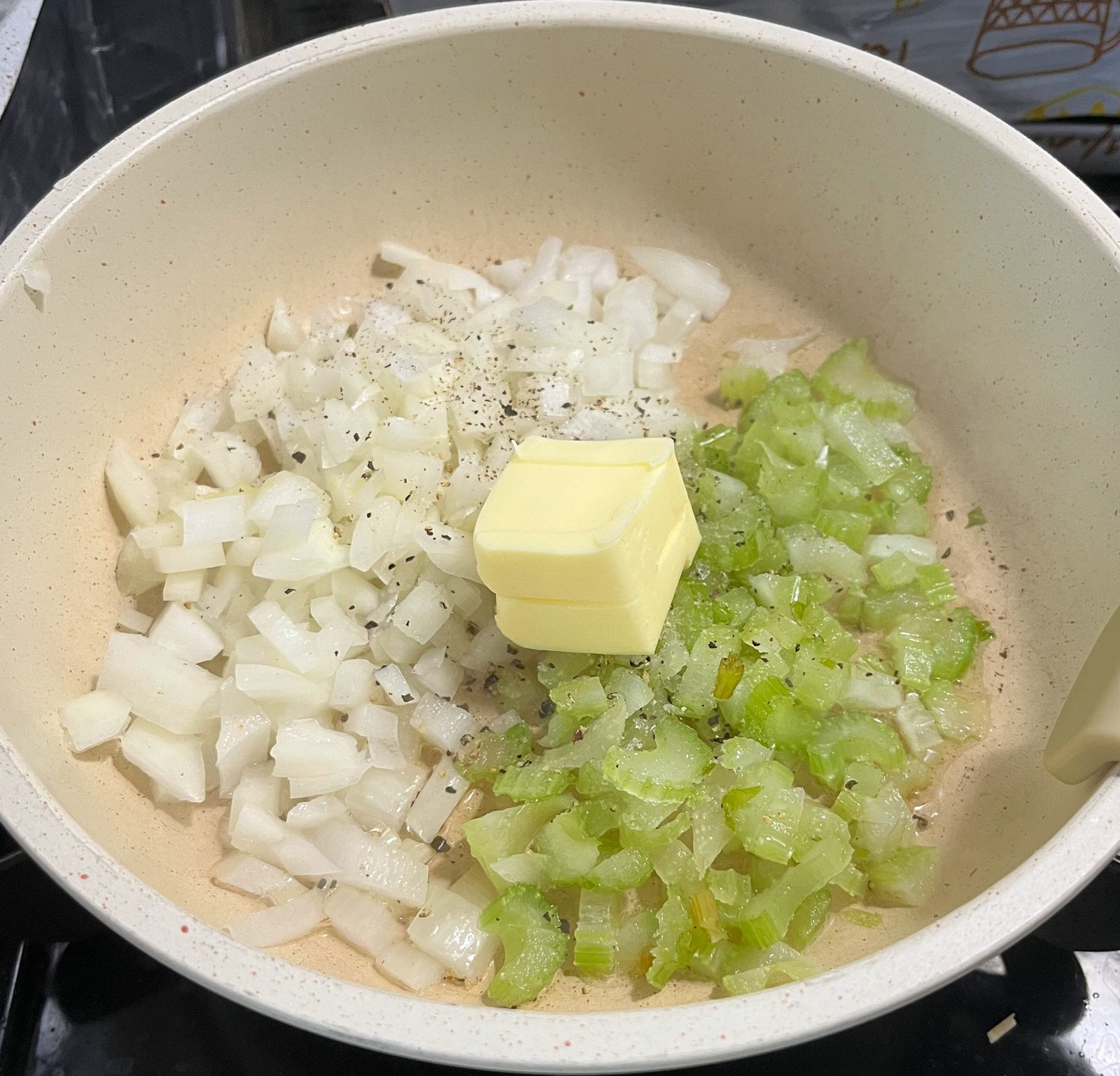 stuffing onions and celery with 2 pats of butter